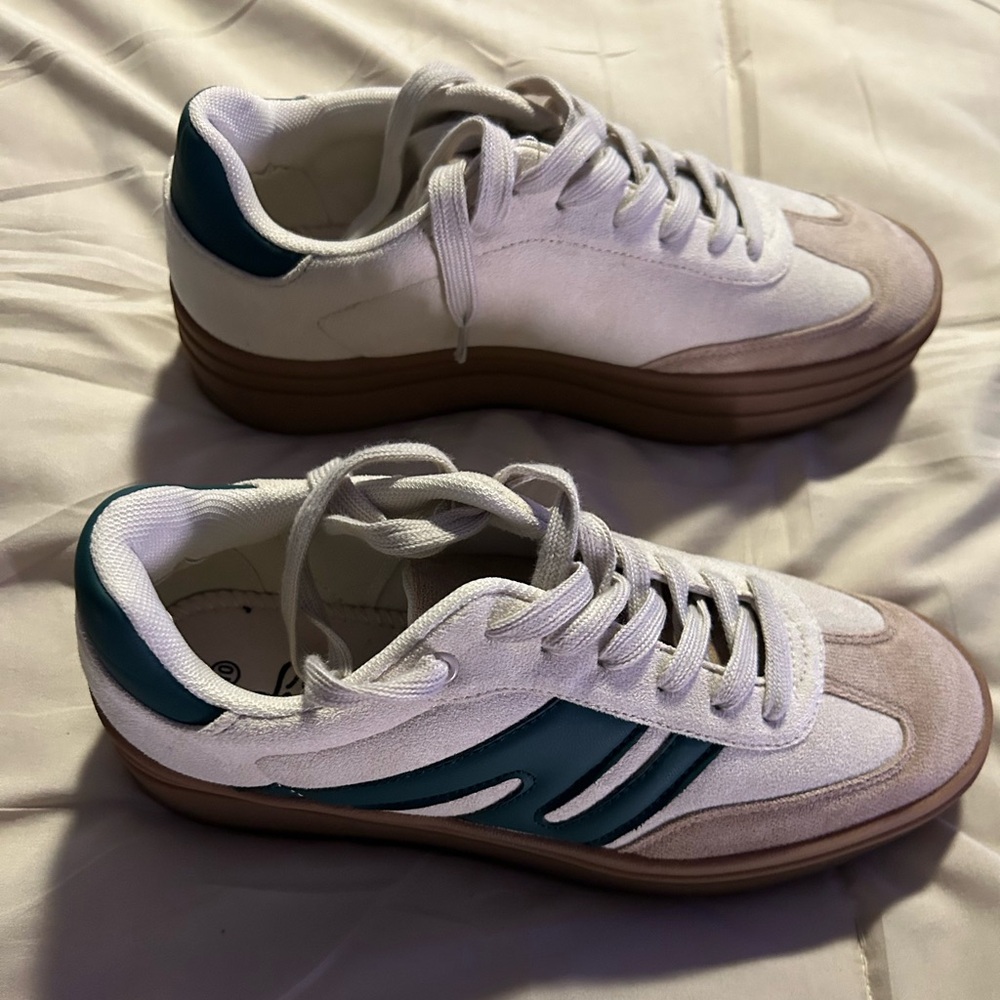 Boutique platform style sneakers. Brand new in box. Size 10.